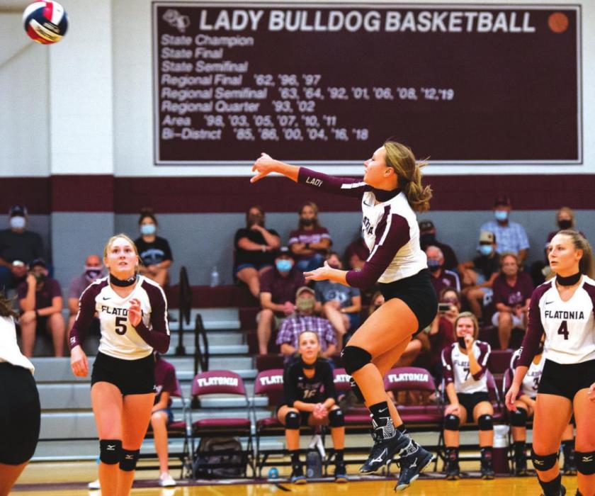 Flatonia’s Ali Janecka goes up for the hit in Tuesday’s game against Hallettsville.
