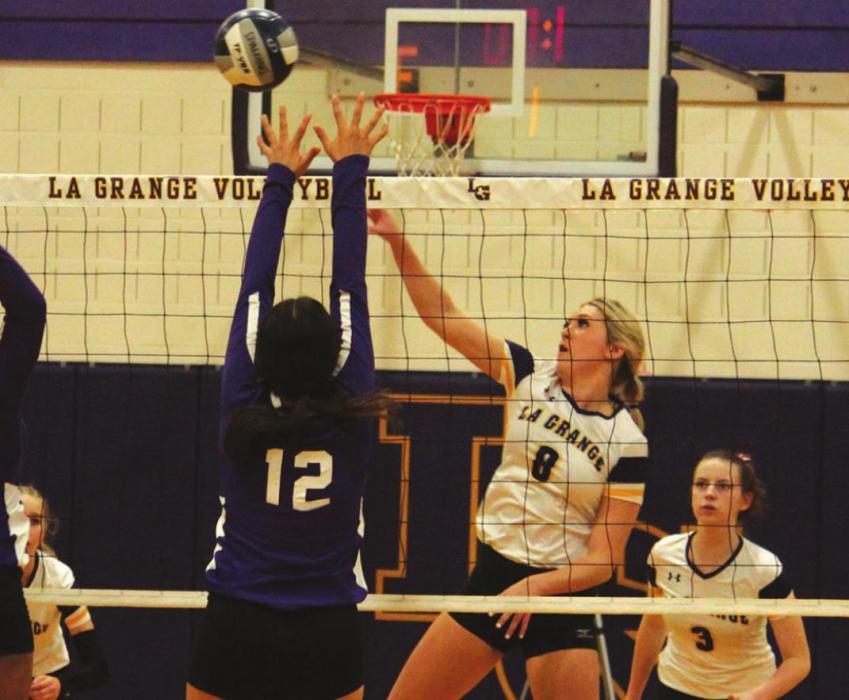 La Grange’s Layne Wied spikes a point for the Lady Leps in Friday’s win over Austin Achieve. Photos by Jeff Wick