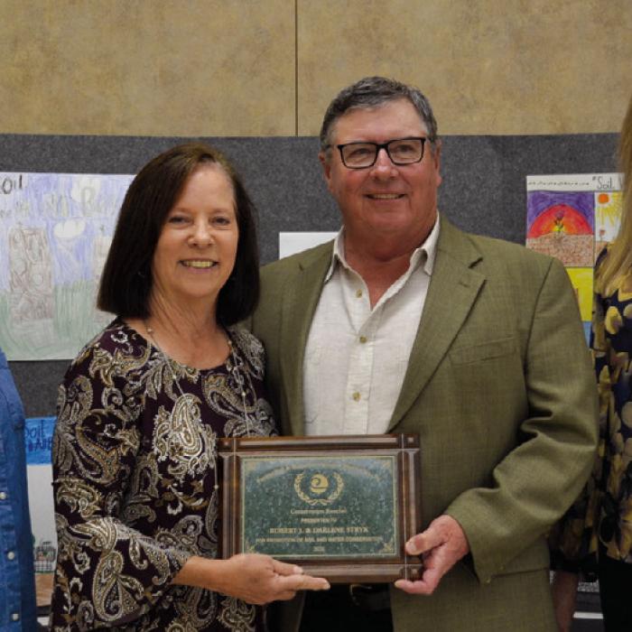 Conservation Rancher-Robert J. “Bob” and Darlene Stryk presented by Sherry Pfluger-Round Top State Bank and Jessica Montez-Fayette Electric Cooperative.
