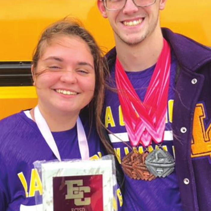 La Grange swim team captains Avery Koehl and Trey Cunningham pictured with the girls 2nd place plaque after the El Campo meet.