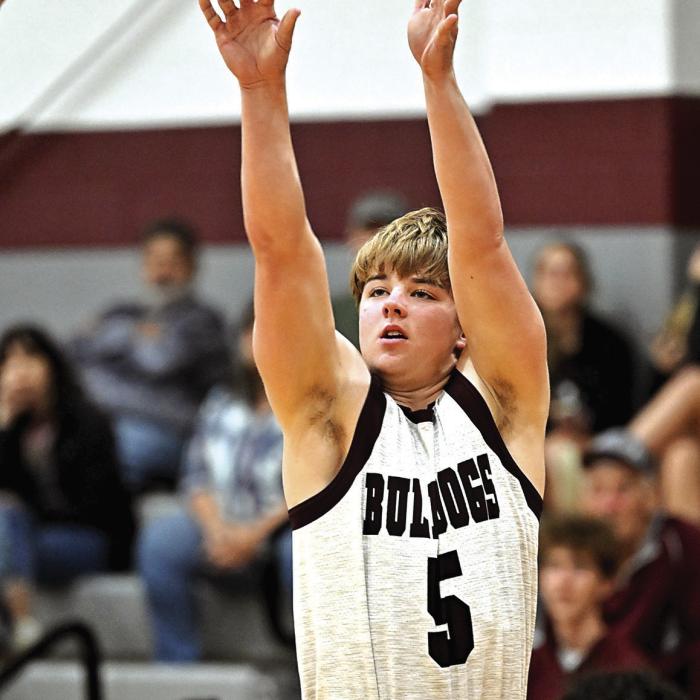 Dayton Cliffe puts up a three pointer Tuesday night in Flatonia’s last home game for the season. Photos by Stephanie Steinhauser