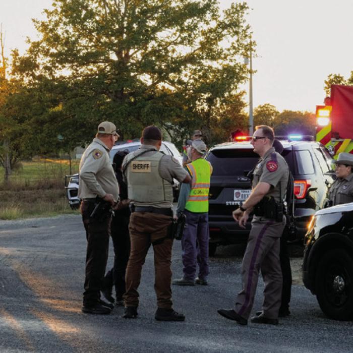 Local first responders gathered at a command post near Muldoon to search for a Cessna plane that supposedly crashed in the area. They later learned that the aircraft had crashed miles away in Caldwell County, with no reported injuries. Photo by Andy Behlen