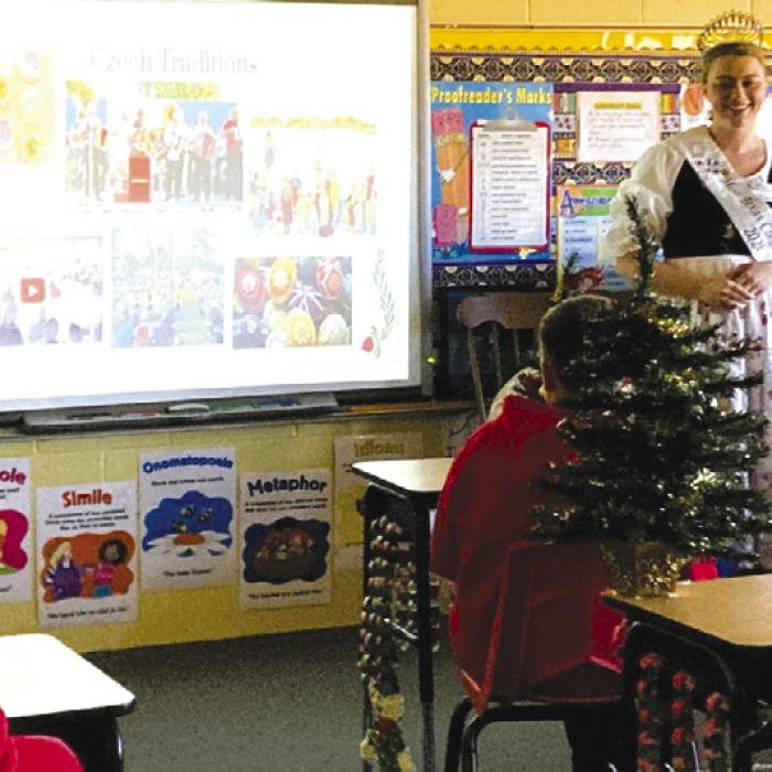 Madelyn Karstedt, Miss Texas Czech Slovak Queen, gave a presentation about Czech Christmas traditions and customs to St. Rose of Lima Catholic School junior high students on Wednesday, Dec. 11. Students learned new Czech words and prayed the Hail Mary together. Good luck to Madelyn as she prepares for the national competition in August.