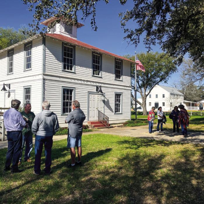 Members of the public waited outside for nearly two hours while the Round Top Town Council met in executive session to discuss the County’s proposal for the old precinct courthouse. Photos by Andy Behlen