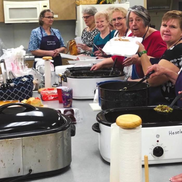 The ladies at Holy Cross served a fabulous turkey and dressing meal with all the trimmings at their annual “Over 80s” dinner on Sunday, Dec. 5. This event honors members of the congregation that are over 80 years of age as well as those who contribute to the sewing circle efforts each week.