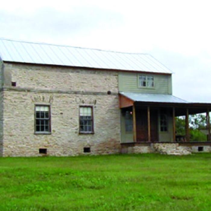 Shots of the historic house before (left) and after (right) the Crawfords’ renovation.