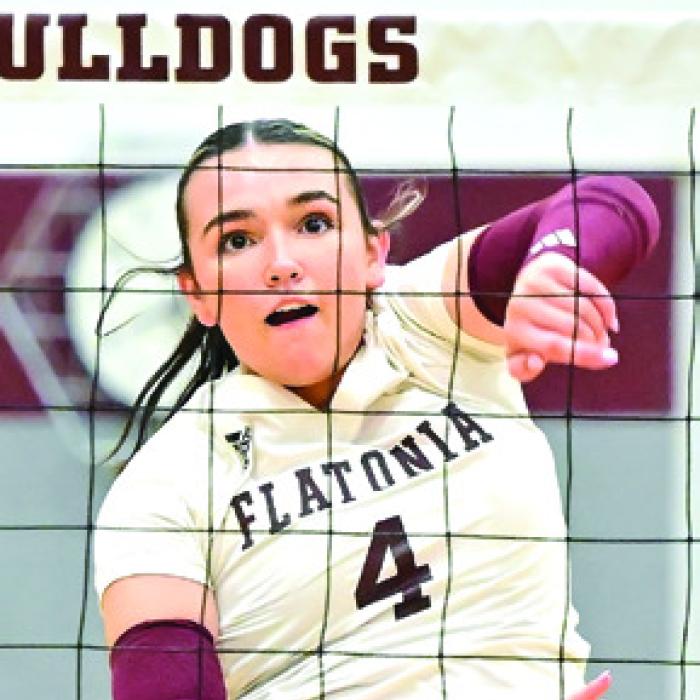 Kat Sullivan picks hits her 1,000th kill as a Lady Bulldog. Photo by Stephanie Steinhauser