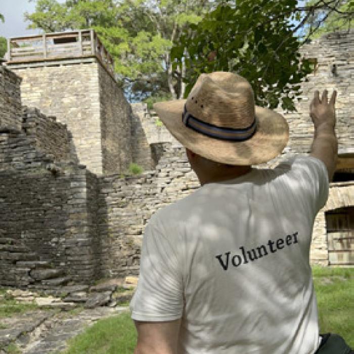 Longtime volunteer Greg Walker leads a tour through the ruins of Kreische Brewery. Docents learn about the sites’ history and then retell it to visitors in tours throughout the grounds.