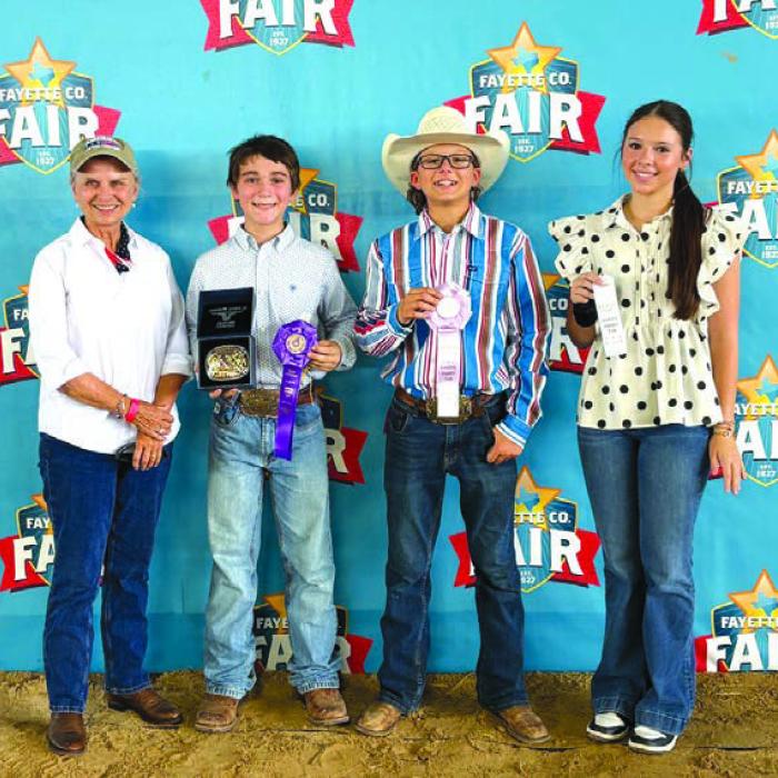 Overall High Point Winners, Intermediate, buckle sponsor in memory of Emil Thomas, Elaine Thomas: Crockett Guenther, Tate Fritsch and Alexis Berkenhoff.