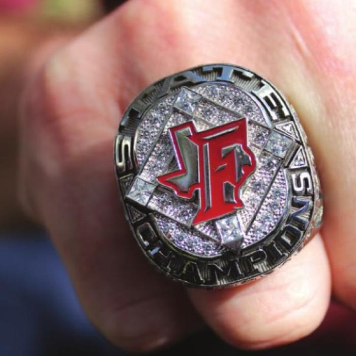 A close-up of Coach Clint Jaeger’s championship ring.