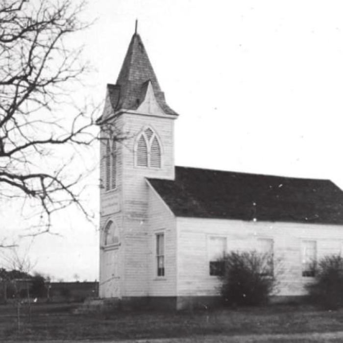 The Koenig family attended Trinity Lutheran Church at Black Jack Springs, where Mrs. Koenig played the organ for many years. The church was eventually demolished.