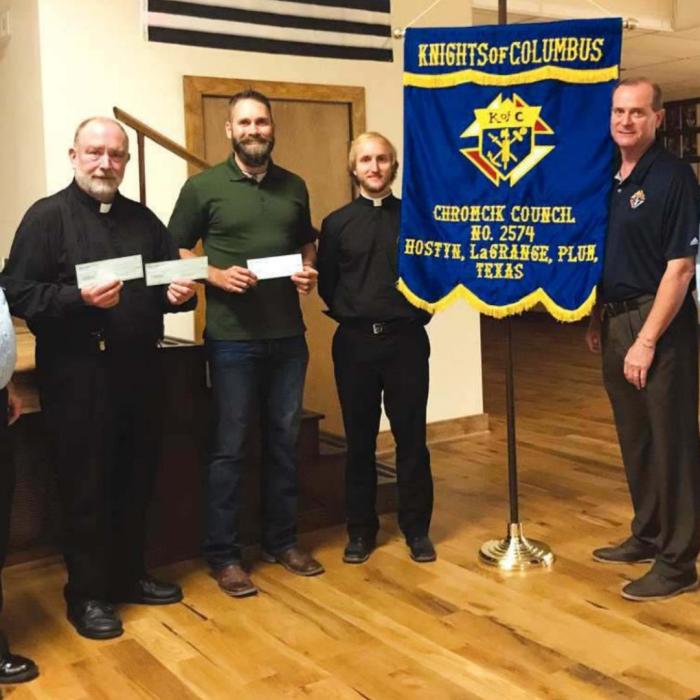KC Council No. 2574 Presents Checks