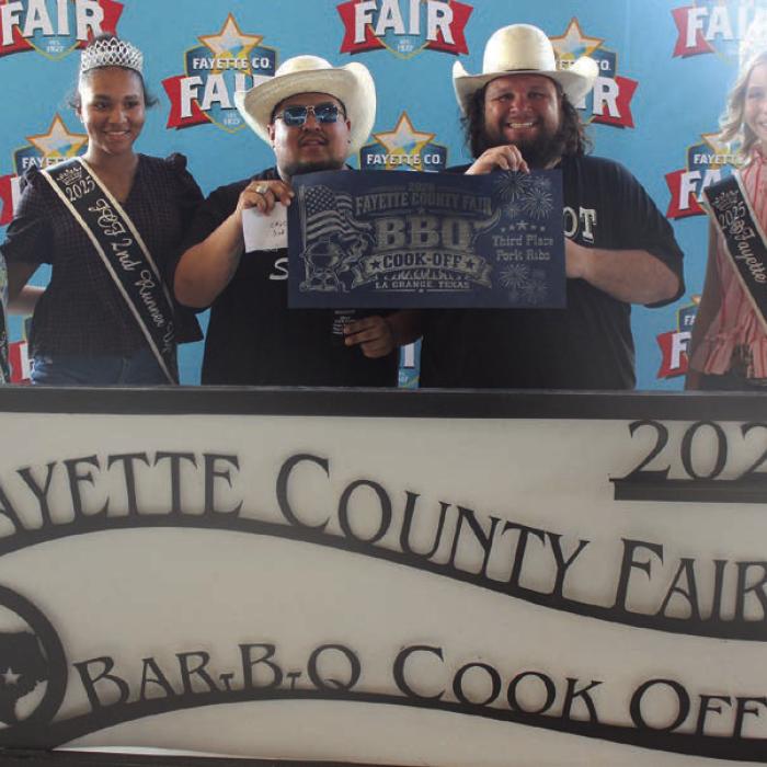 The team of G-Spot Smokers won third place overall at Saturday’s Fayette County Fair Bar-B-Q Cook Off. Left to right, 2025 Jr. Miss Fayette County Anabelle Zwahr, 2025 Queen second runnerup Keanna Henderson, Pancho Segura, Joseph Posas and 2025 Fair Queen Hailey Janish.