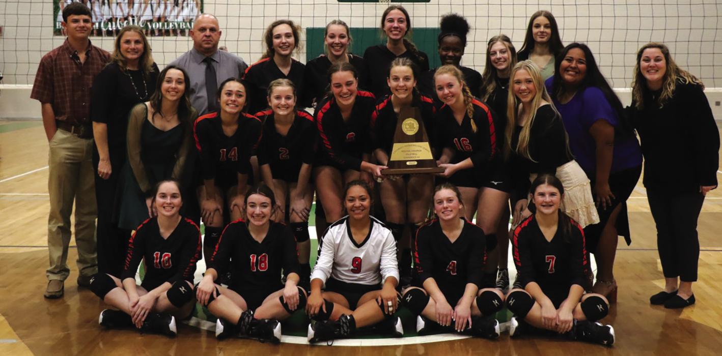 The Schulenburg volleyball team holds up the regional trophy after beating Johnson City Saturday in Brenham. Photos by Audrey Kristynik