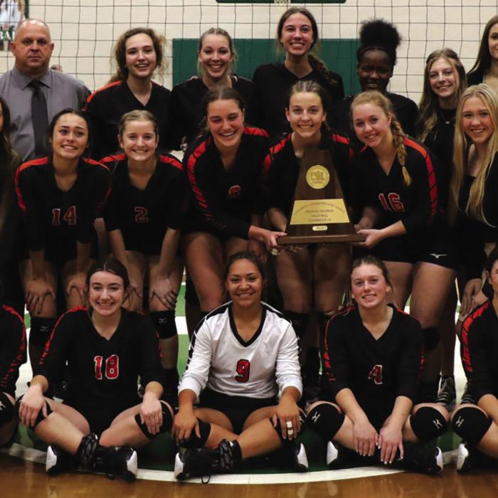 The Schulenburg volleyball team holds up the regional trophy after beating Johnson City Saturday in Brenham. Photos by Audrey Kristynik
