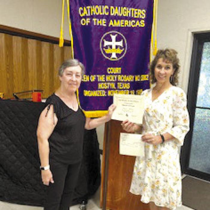 Brenda Fietsam won first place for her poetry in Division IV. It will now be advanced to the National Level. The Court also won a first place award in the State Circle of Love Contest in Category IV Education. Accepting the award is Shirley Macik, Local Education Chair. From left: Shirley Macik and Brenda Fietsam.