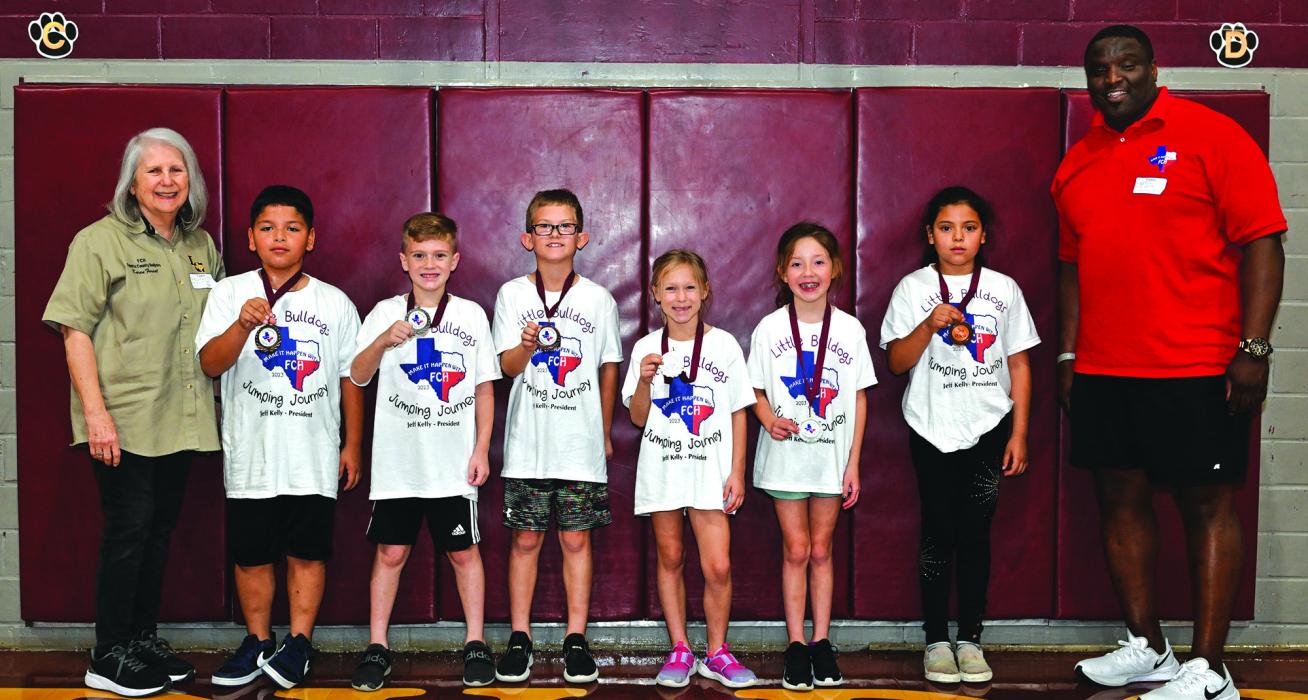 Flatonia 2nd graders participated in a jump rope contest on Tuesday. Pictured here are Karen Forrest, winners of the jump rope contest Romeo Muniz, Brycen Marrs, Ty Hoffman, Cara Pavlicek, Kendra Palmer, Earth Segura and Jeff Kelly Jr. Photo by Stephanie Steinhauser