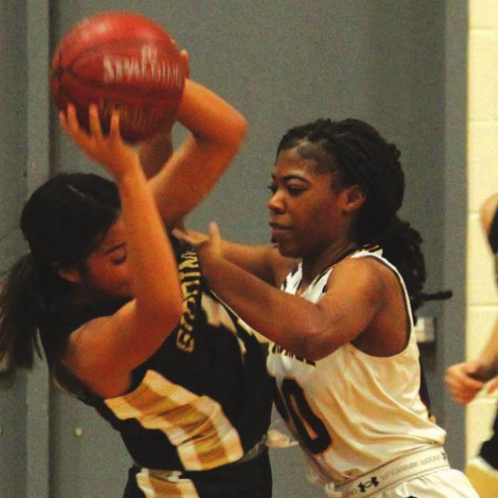La Grange’s Lyric Sampson plays some tough defense against the Lady Buffs Tuesday. Photos by Jeff Wick