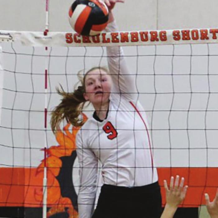 Schulenburg’s Erica Otto spikes a ball last week against Weimar. Photo by Audrey Kristynik