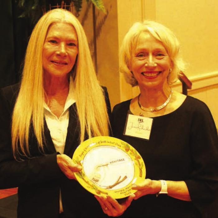 The late Gladys Bohot Giese was honored Sunday in the area of “Heritage” for writing the Warda News column for over 50 years. She was introduced by Jeff Wick. Her daughter, Robin Wedgeworth, left, accepted on her behalf. Right is Janis Richardson President, League of Women Voters of South Central Texas.