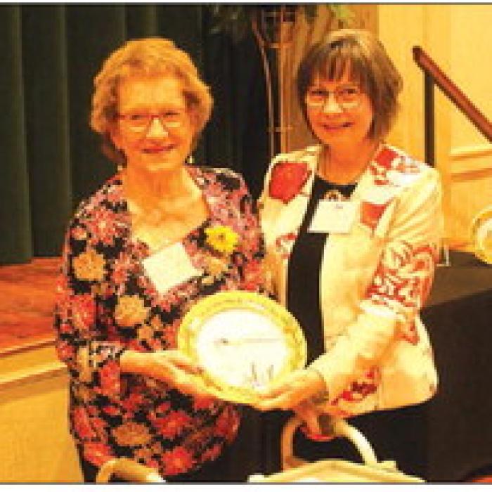 Lucille Ann Blume Strickland, left, was honored Sunday in the area of “Steadfastness.” Introducing her was LWV program coordinator Helen Niesner, right.