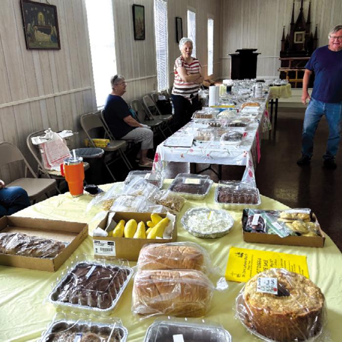 Pictured here at the St. John church bake sale are Maxine Brugger, Gladys Koehl and Robert Kasmiersky.