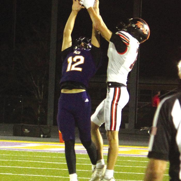 Left: La Grange’s Colt Jobb (No. 12) would out-jump this Smithville receiver to snag an interception on this play Friday. Photos by Jeff Wick