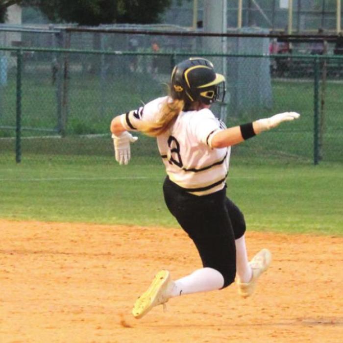 La Grange’s Dela Rosa sisters get a force out at second Tuesday as Abigail throws to Alyssa covering the base.