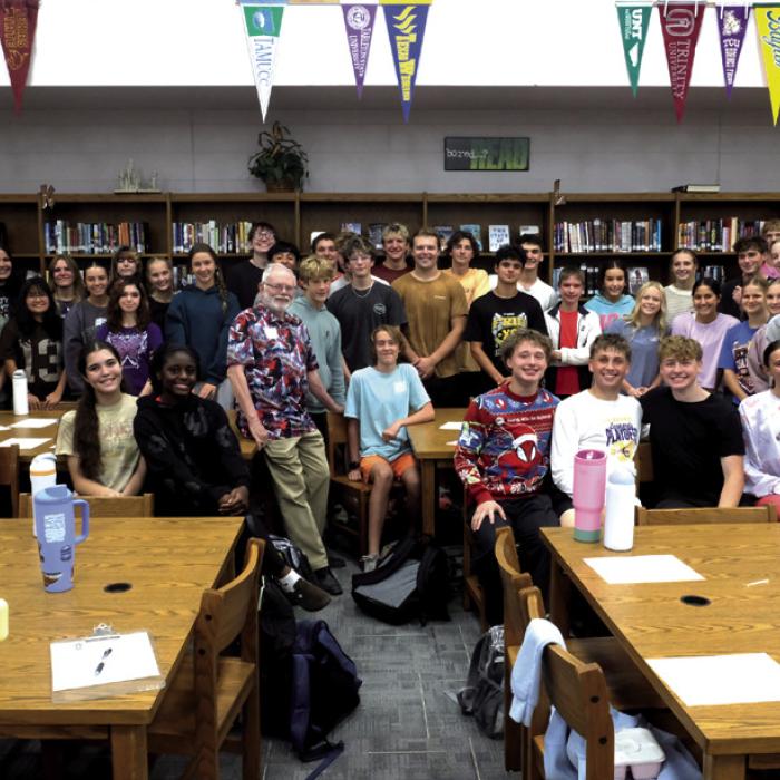 Fayette County Semiquincentennial Committee Chairman Larry Jackson spoke to the La Grange High School Leo Club about the Liberty Tree project. Several Leo Club members volunteered to help distribute the trees on Oct. 3. Photo by Andy Behlen