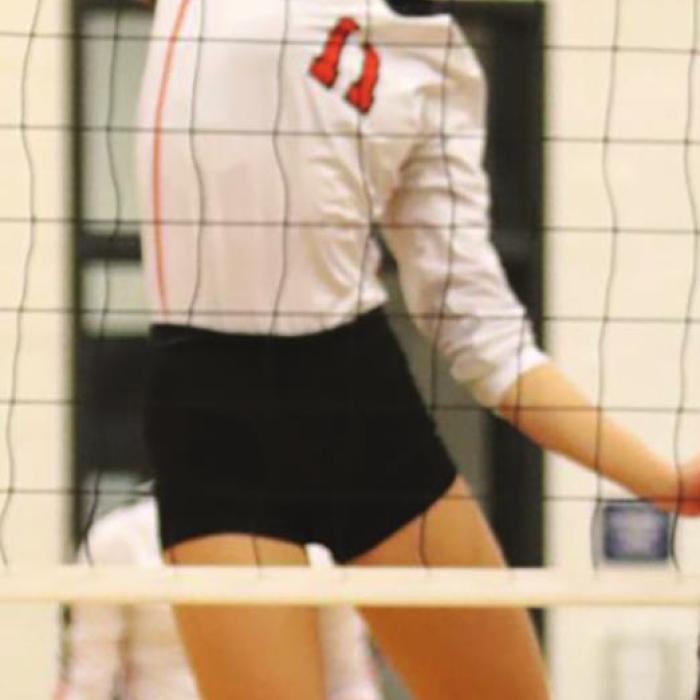 Schulenburg’s Meredith Magliolo spikes the ball in Tuesday’s playoff match. Photo by Audrey Kristynik