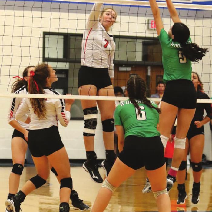 Schulenburg’s Kloe Kutac with a point in Tuesday’s playoff match. Photo by Audrey Kristynik