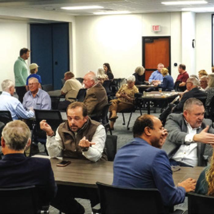 The old Bealls department store in La Grange is now a modern training facility. Shown here are the folks who showed up to Thursday’s dedication of the building. Photo by Andy Behlen