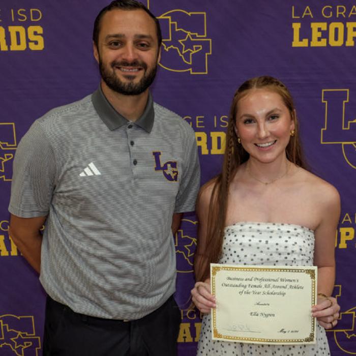Ella Nygren received the Business and Professional Women’s Outstanding Female All-Around Athlete of the Year Scholarship and DAR Good Citizen Scholarship. She is pictured here with presenter Ryan O’Neal.