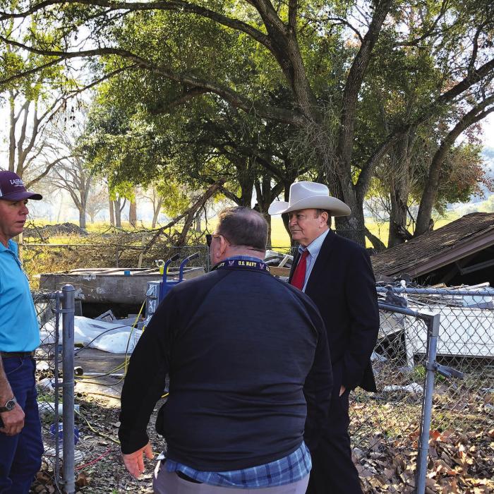 Fayette County Judge Dan Mueller, right, and Commissioner Harvey Berckenhoff, left, toured the demolition area on Friday, January 6.