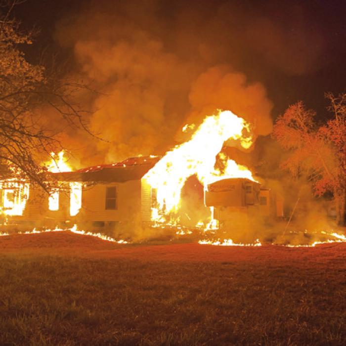 Woman Saved from House Fire