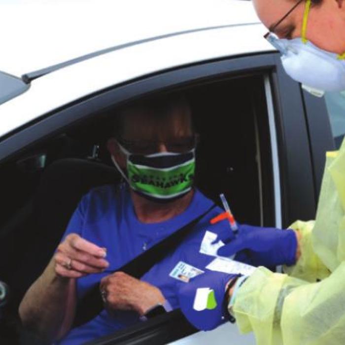 Drive-through COVID vaccines at Tejas clinic in La Grange in March.