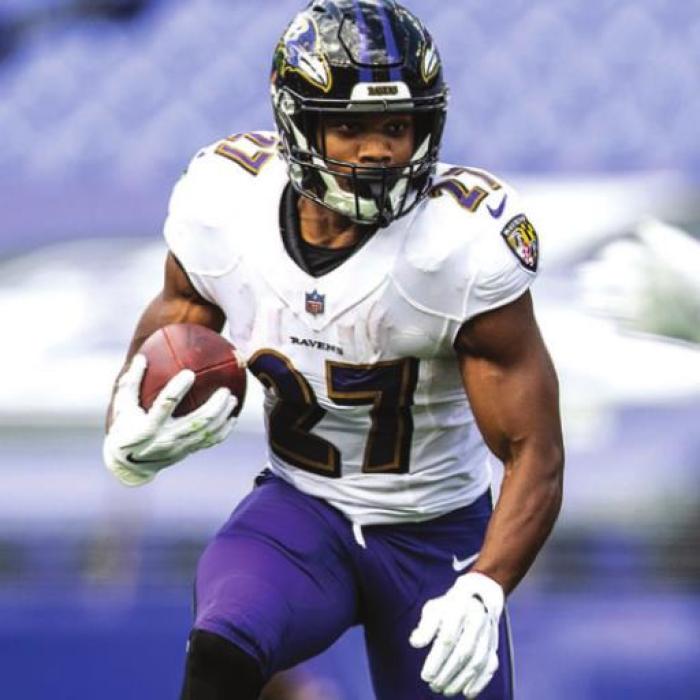 La Grange’s J.K. Dobbins had a roller-coaster 2021. He led Baltimore to a playoff win in January but suffered a season-ending knee injury before the 2021 fall season began.