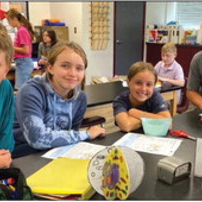 FISD Jr. high students working on plant and cell projects. Pictured from left: Cullen Hunger, Baylee Stout, Raylee Denham and Tyler Kolenovsky.
