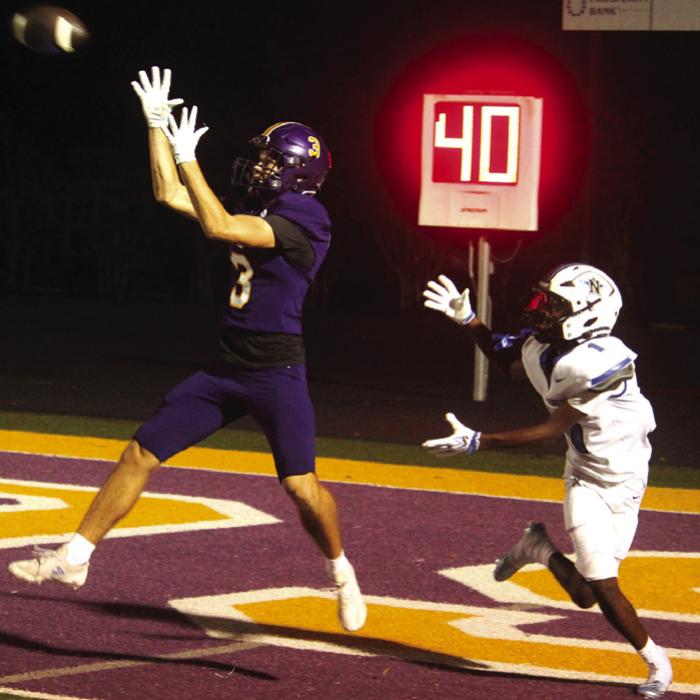 La Grange’s Rogan Mihatsch makes an interception in front of Navasota receiver Caysien Douglas Friday in the endzone. Photo by Jeff Wick