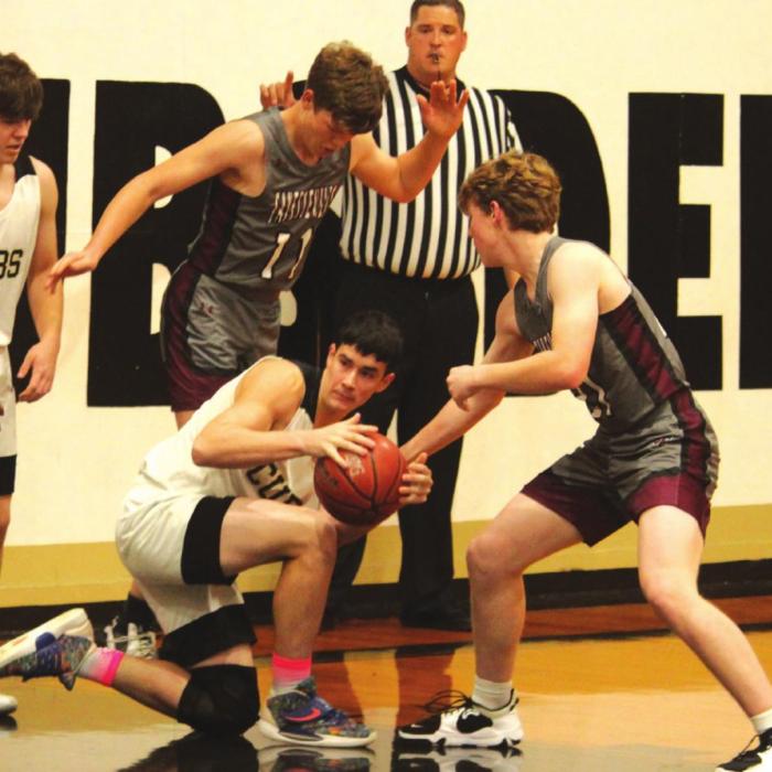 The defense of Fayetteville’s Jake Kubala and Cash Smith leave Round Top-Carmine’s Kannyn Goehring looking for options Friday. Photo by Jeff Wick