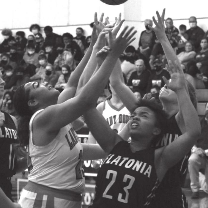 Schulenburg’s Airyanna Rodriguez, left, was a force inside Tuesday for the Lady Horns. Here she battled Flatonia’s Y’Lila Willis for a loose ball. Photo by Jeff Wick