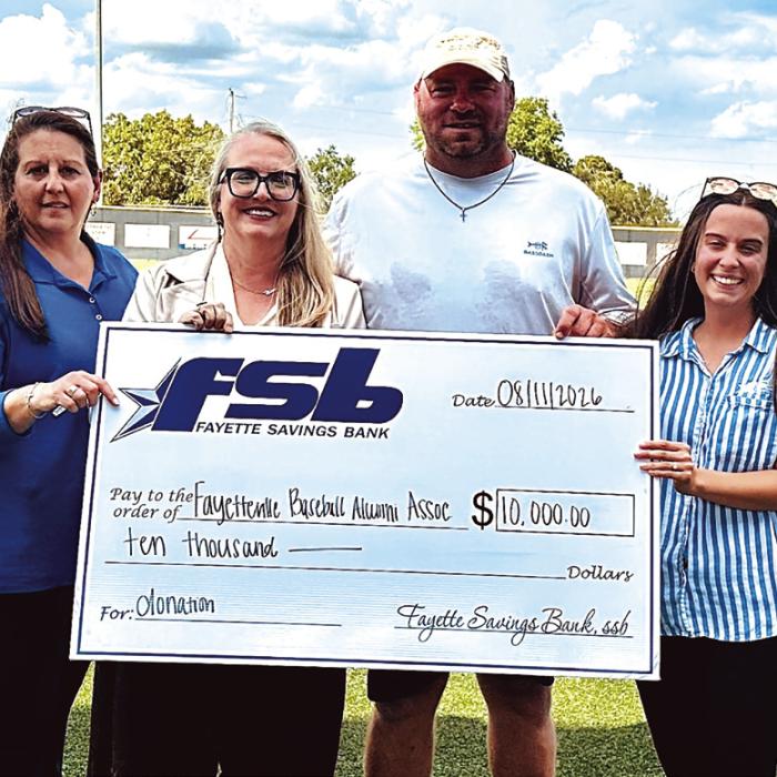 Pictured from left are FSB Fayetteville staff Tammy Beseda and Sarah Bertsch, Fayetteville Baseball Alumni Association President Josh Vitek, and Nicole Davis, FSB Fayetteville staff.