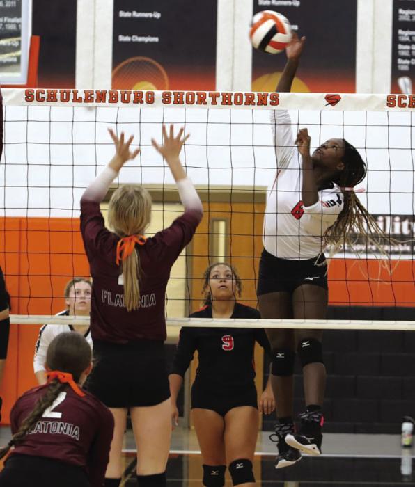 Schulenburg’s Jesslyn Gipson elevates for a spike in Friday’s match against Flatonia. Photo by Audrey Kristynik