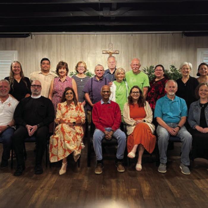 Pictured are (front row, from left) Bob Lee, Fr. Richard Barfield, Irma Rerich, Dr. Michael Fonseca, Stacy Oeding, Deacon Dwain Dungen, Bethany Muzny, (back) Brianne Bernsen, Andre Muniz, Diane Holub, Mary Beth Koenig, Ernie Lozano, David Rohan, Elizabeth Wenke, Russell Wenke, Amanda Brown, Kathi Mickan and Ana Ahrendt.
