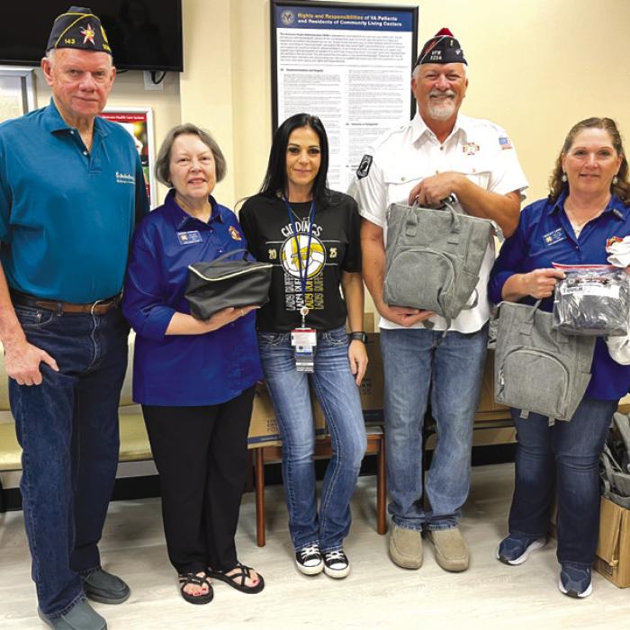 Receiving items for the Veterans Clinic in La Grange was, center, Brittney Schneider, AMSA. The donation was made by the American Legion Post No. 143 Schulenburg through the Veterans Outreach Program. Pictured from left, Jim Brown, Donation Chairman of American Legion Post 143 Schulenburg; Marilyn Kothmann, President VFW Auxiliary No. 5254 La Grange; Richard Gray, Commander VFW No. 5254 La Grange; and Becky Leer, Chairman of the Veterans Outreach Program, VFW Auxiliary No. 5254 La Grange.