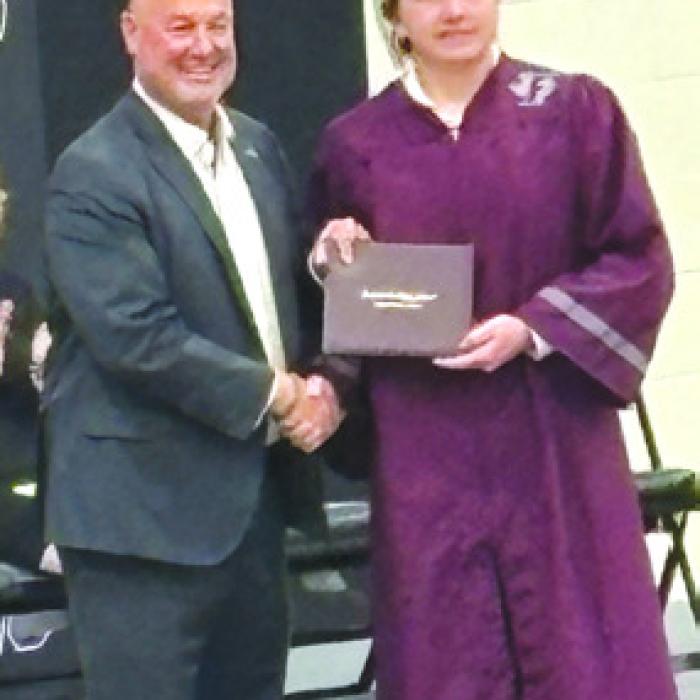 Kasen Kocian with Fayetteville Superintendent Dr. Jeff Harvey.
