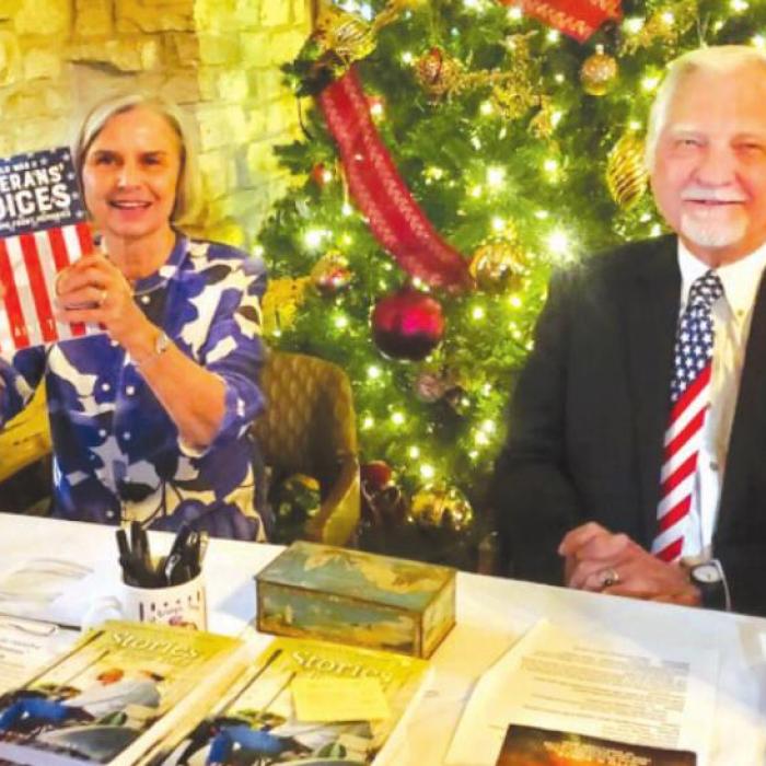 Elaine Thomas was assisted in book sales by John Marburger.