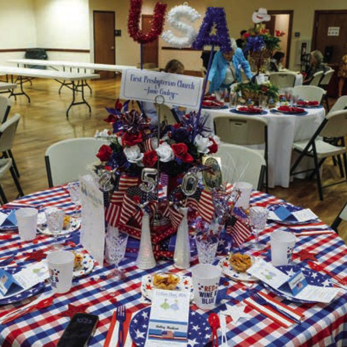 First Presbyterian Church and Janie Cooley sponsored this patriotic- themed table.