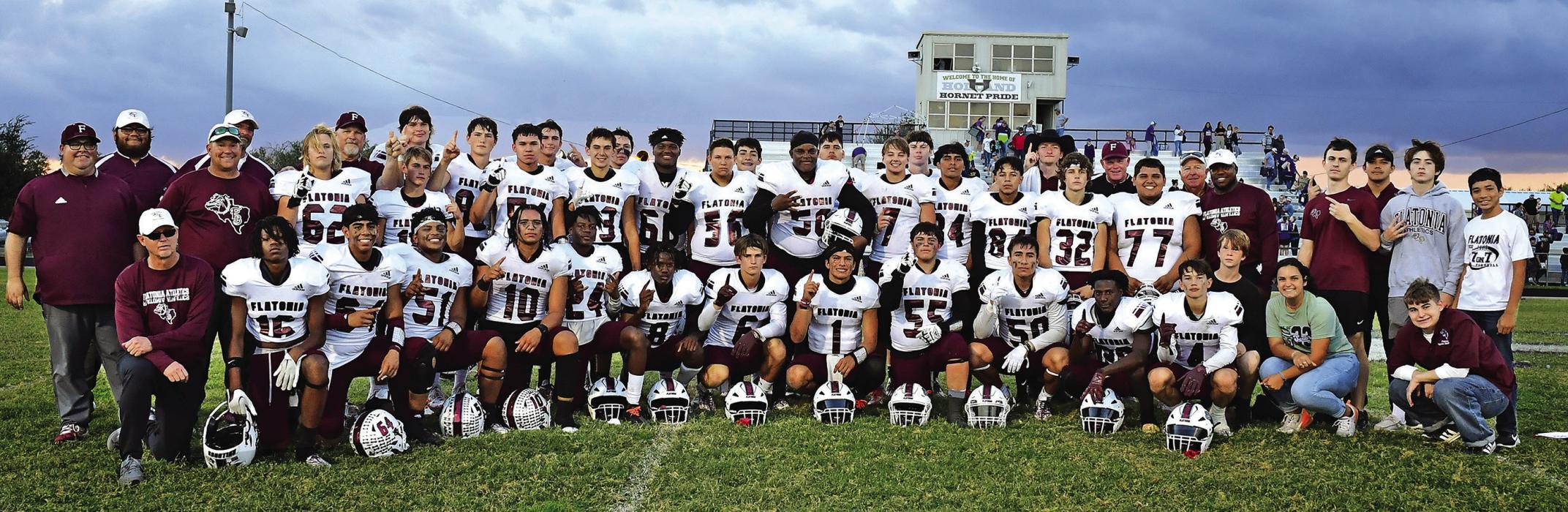 The Flatonia Bulldogs earned the title of District Champions on Friday after defeating the Holland Hornets 49-17. The Bulldogs traveled to Holland as a last minute decision was agreed upon to play at 4 p.m. on Friday afternoon to avoid inclement weather. The Bulldogs will travel to San Antonio next Thursday to take on Junction in the Bi-District playoff game. Photo by Stephanie Steinhauser