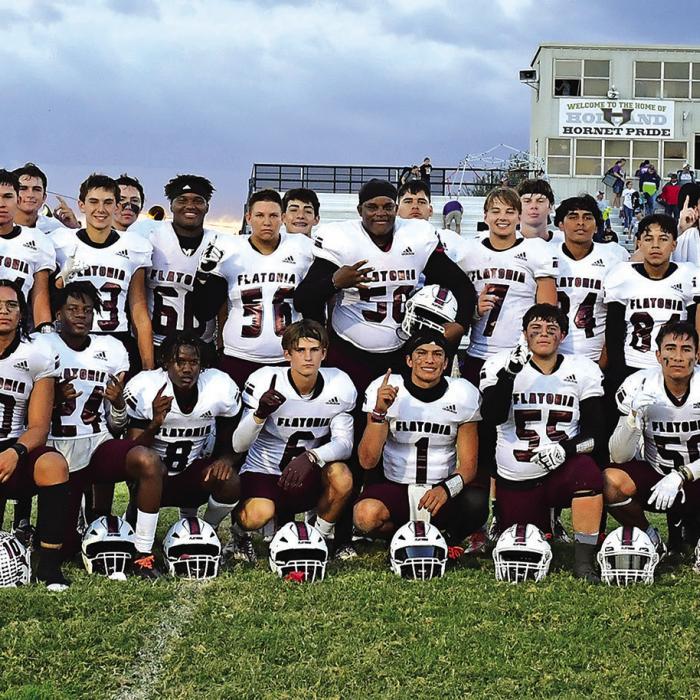 The Flatonia Bulldogs earned the title of District Champions on Friday after defeating the Holland Hornets 49-17. The Bulldogs traveled to Holland as a last minute decision was agreed upon to play at 4 p.m. on Friday afternoon to avoid inclement weather. The Bulldogs will travel to San Antonio next Thursday to take on Junction in the Bi-District playoff game. Photo by Stephanie Steinhauser